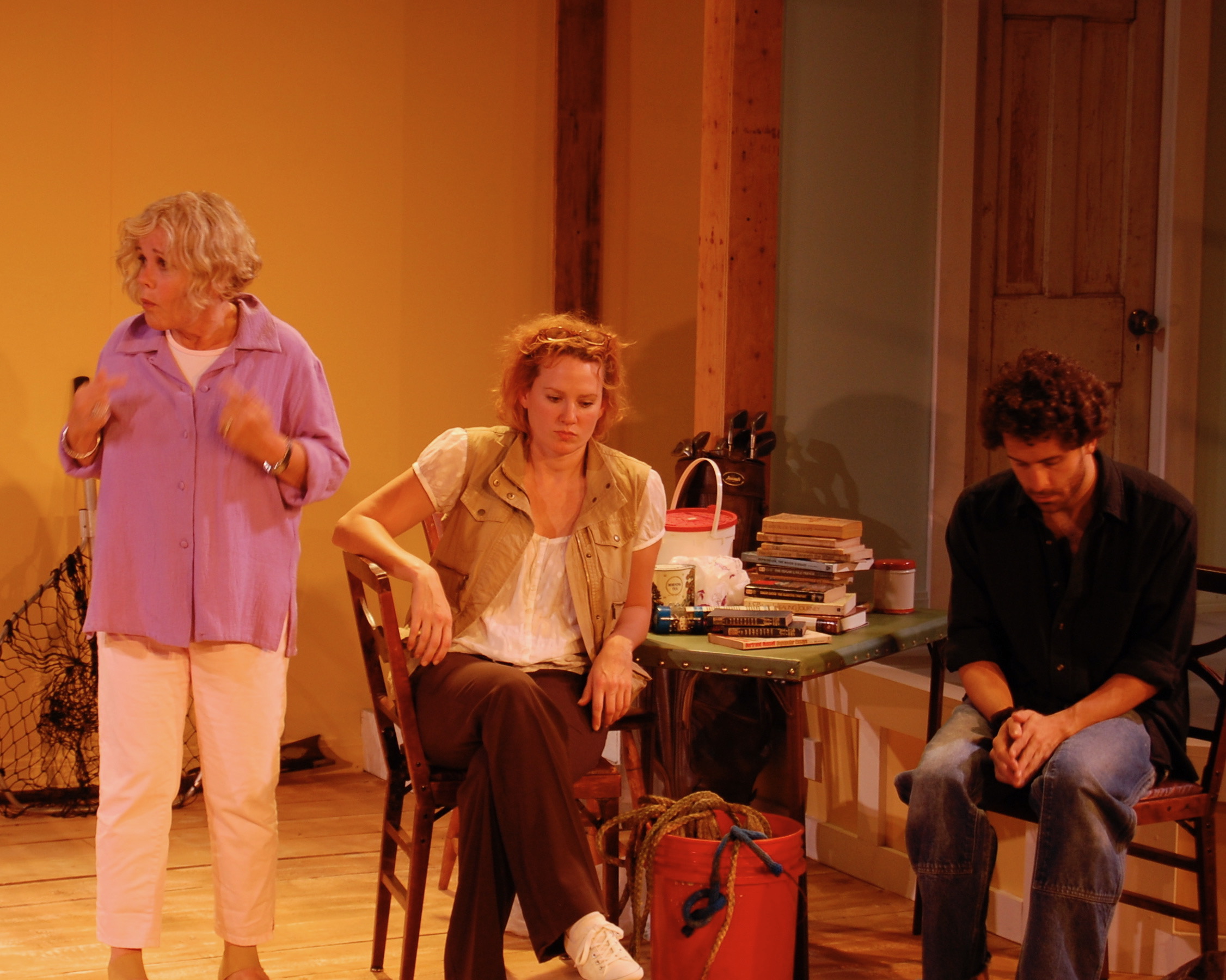 Three performers in a tense family scene from The Siegels of Montauk
